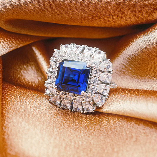 Lab Grown Royal Blue Sapphire Ring | Zirconia Border | 10x10mm Emerald cut Center Stone | Elegant & Luxurious